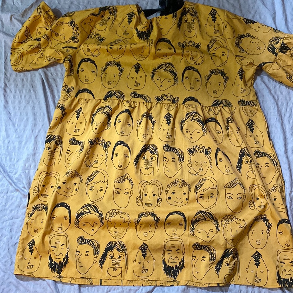 Plus size woman’s many faces dress